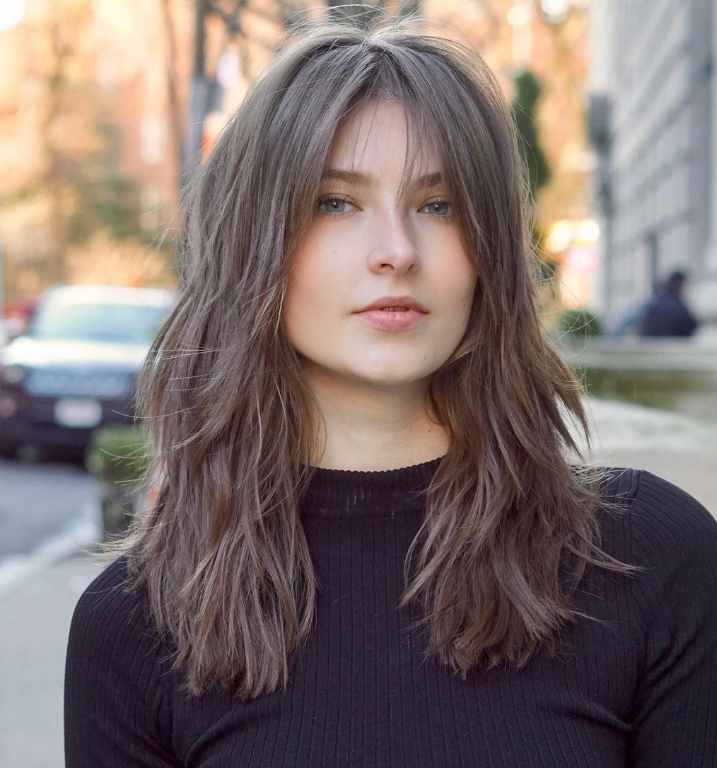 Long Layered Hair with Bangs: 2025’s Top Trend for Volume & Style