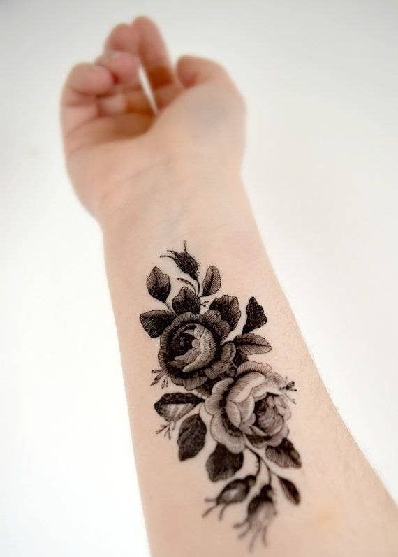 Black and white floral tattoo design